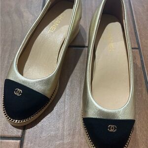 CHANEL Gold and Black Flats with Chain Detail